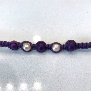 Purple braided bracelet with pearl and purple wood beads, 13”